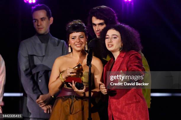 Julia Mestre, Zé Ibarra and Dora Morelenbaum of Bala Desejo accept the award for Contemporary Pop Album in Portuguese Language for their song "Sim...