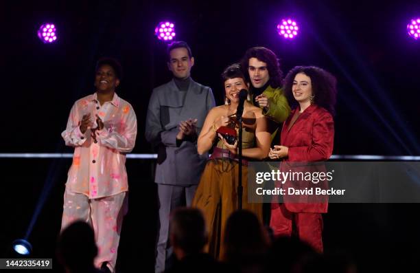 Julia Mestre, Zé Ibarra and Dora Morelenbaum of Bala Desejo accept the award for Contemporary Pop Album in Portuguese Language for their song "Sim...