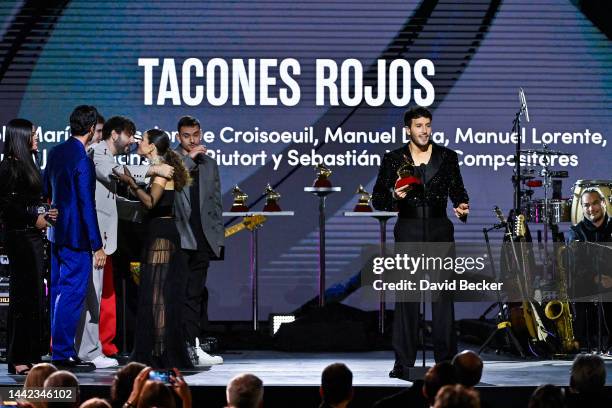 Sebastián Yatra speaks onstage with Juanjo Monserrat, Manual Lara and Manuel Lorente after accepting the award for Best Pop Song for the song...