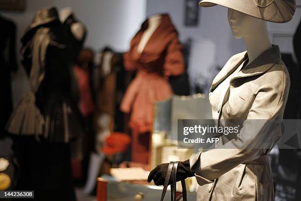 Picture taken on May 9, 2012 shows dresses worn by German-US actress Marlene Dietrich presented at the exhibition "Stars in Dior" at the Christian...