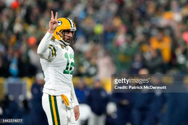 Aaron Rodgers of the Green Bay Packers calls for a two point conversion after a touchdown against the Tennessee Titans during the third quarter in...