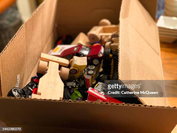 box of assortment of toys - toy box stock-fotos und bilder