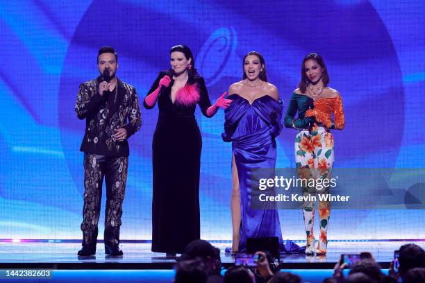 Co-hosts Luis Fonsi, Laura Pausini, Thalía, and Anitta speak onstage during The 23rd Annual Latin Grammy Awards at Michelob ULTRA Arena on November...