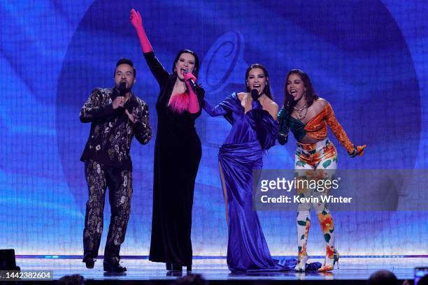 Co-hosts Luis Fonsi, Laura Pausini, Thalía, and Anitta speak onstage during The 23rd Annual Latin Grammy Awards at Michelob ULTRA Arena on November...
