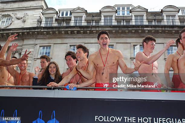 Life Guards attend the Gilly Hicks & Hollister Regent Street flagship store opening with 100 Hot Lifeguards on 4 Double Decker Bues on May 12, 2012...