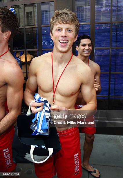 Life Guards attend the Gilly Hicks & Hollister Regent Street flagship store opening with 100 Hot Lifeguards on 4 Double Decker Bues on May 12, 2012...