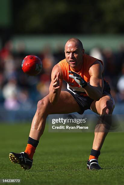 Chad Cornes of the Giants marks during the round seven AFL match between the Greater Western Sydney Giants and the Gold Coast Suns at Manuka Oval on...