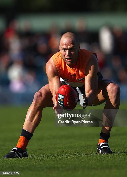 Chad Cornes of the Giants marks during the round seven AFL match between the Greater Western Sydney Giants and the Gold Coast Suns at Manuka Oval on...