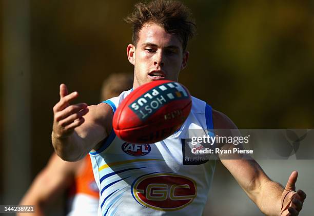 Luke Russell of the Suns marks during the round seven AFL match between the Greater Western Sydney Giants and the Gold Coast Suns at Manuka Oval on...