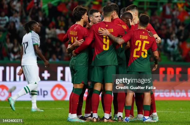 Bruno Fernandes of Portugal celebrates with teammates after scoring a goal during the International Friendly match between Portugal and Nigeria at...