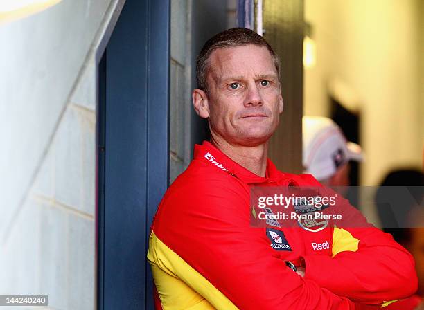 Guy McKenna, coach of the Suns looks on before the round seven AFL match between the Greater Western Sydney Giants and the Gold Coast Suns at Manuka...