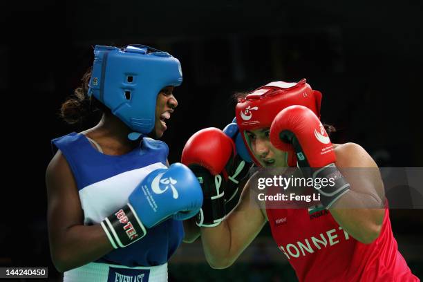 Claressa Shields of the United States fights against Pooja Rani of India in the Women's 75kg preliminary match during the AIBA Women's World Boxing...