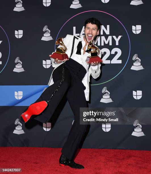Sebastian Yatra poses with the awards for Best Pop Song and Best Vocal Album in the media center at the Mandalay Bay Events Center on November 17,...