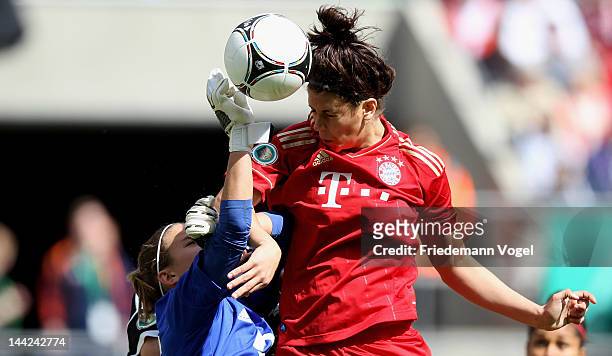 Desiree Schumann of Frankfurt and Radoslav Zabavnik of Bayern battle for the ball during the DFB Women's Cup final match between 1. FFC Frankfurt and...