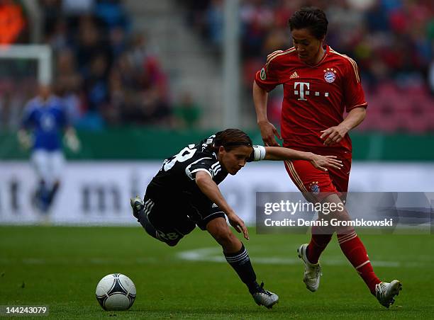 Sandra Smisek of Frankfurt challenged by Nicole Cross of Muenchen during the Women's DFB Cup Final between 1. FFC Frankfurt and Bayer Muenchen at...