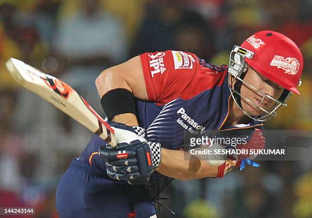 Delhi Daredevils batsman David Warner plays a shot during the IPL Twenty20 cricket match between Chennai Super Kings and Delhi Daredevils at The M.A....