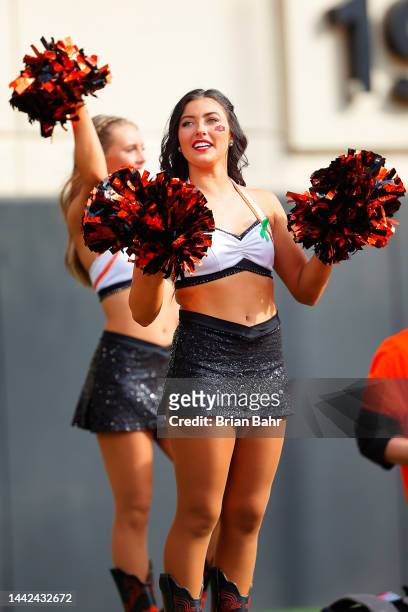 Lauren Stambeck of the Oklahoma State Cowboys pom squad cheers during a game against the Texas Tech Red Raiders at Boone Pickens Stadium on October...
