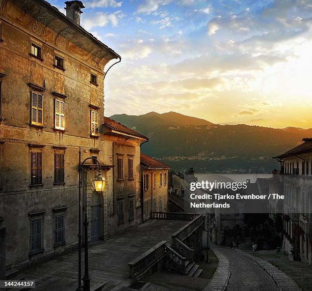 golden sunset in italy - lake orta stock pictures, royalty-free photos & images
