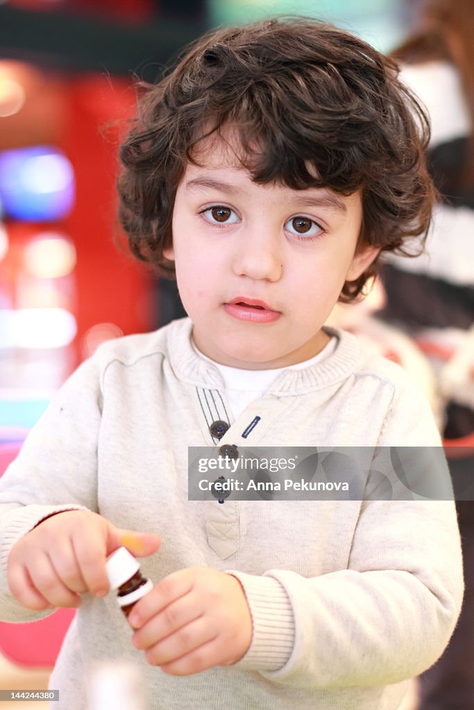 Portrait of curly-haired boy