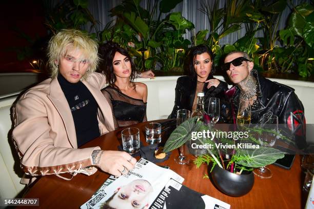 Machine Gun Kelly, Megan Fox, Kourtney Kardashian Barker, and Travis Barker attend the GQ Men of the Year Party 2022 at The West Hollywood EDITION on...