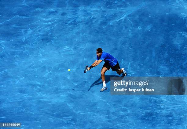 Juan Martin Del Potro of Argentina plays a doublehanded backhand in his semi final match against Tomas Berdych of the Czech Republic during the Mutua...