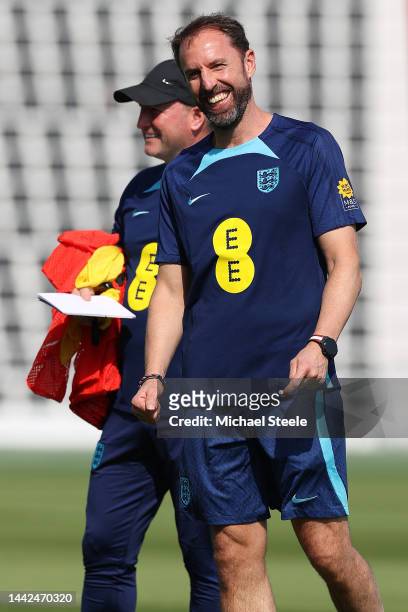 England manager Gareth Southgate in good spirits alongside assistant Steve Holland during the England Training Session at Al Wakrah Stadium on...