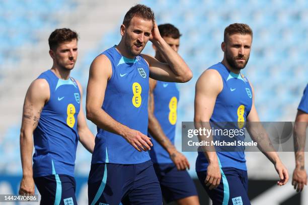 England captain Harry Kane alongside Mason Mount and Luke Shaw during the England Training Session at Al Wakrah Stadium on November 18, 2022 in Doha,...