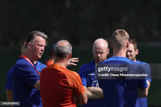 Louis van Gaal, Head Coach of Netherlands, speaks with their players during the Netherlands Training Session at Qatar University training complex on...