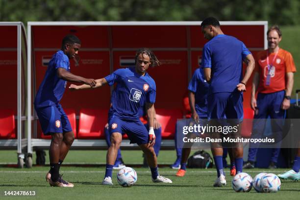 Xavi Simons of Netherlands controls the ball during the Netherlands Training Session at Qatar University training complex on November 18, 2022 in...