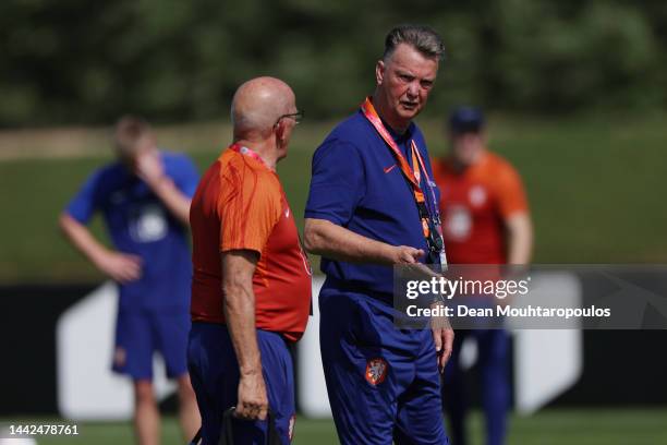 Louis van Gaal, Head Coach of Netherlands, speaks with a member of Netherlands Staff during the Netherlands Training Session at Qatar University...