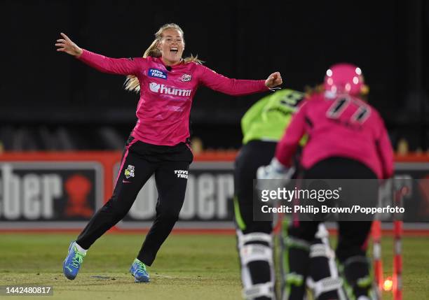 Sophie Ecclestone of Sydney Sixers celebrates after dismissing Tammy Beaumont of Sydney Thunder during the Women's Big Bash League match between...