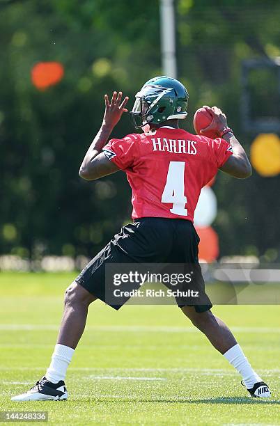 Jacory Harris of the Philadelphia Eagles drops back to pass during rookie mini-camp at their practice facility on May 12, 2012 in Philadelphia,...