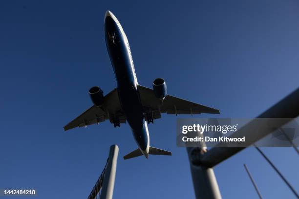 British Airways plane comes in to land at Heathrow's Terminal 4 on November 18, 2022 in London, England. Ground staff from the aviation service...