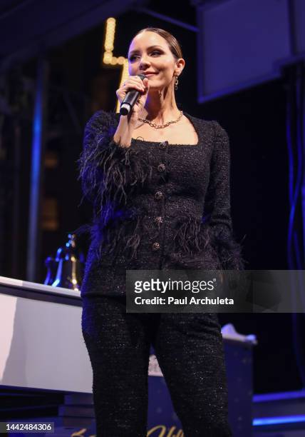 Singer Katharine McPhee performs live at the Rodeo Drive Holiday Lighting Celebration 2022 on November 17, 2022 in Beverly Hills, California.