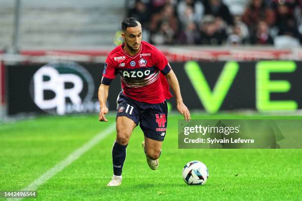 Adam Ounas of Lille OSC in action during the Ligue 1 match between Lille OSC and Angers SCO at Stade Pierre-Mauroy on November 13, 2022 in Lille,...