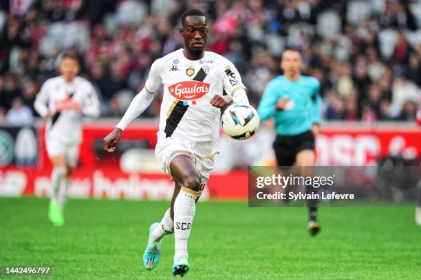 Abdallah-dipo Sima of Angers SCO in action during the Ligue 1 match between Lille OSC and Angers SCO at Stade Pierre-Mauroy on November 13, 2022 in...