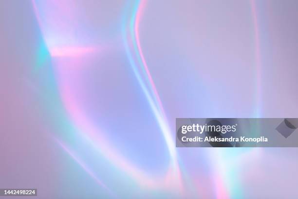 surreal aura rainbow laser light refraction texture overlay effect on white wall - etéreo imagens e fotografias de stock