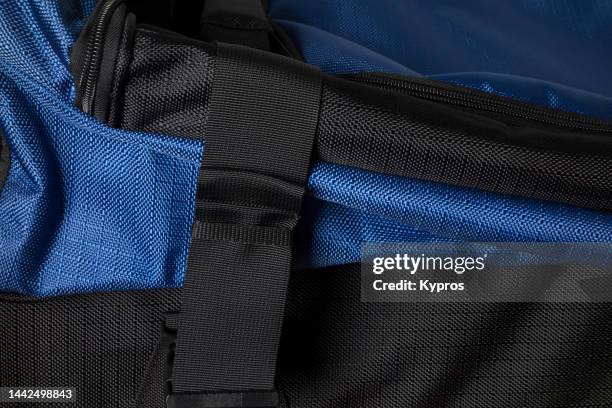 rolling travel bag or duffel luggage - strap stock pictures, royalty-free photos & images