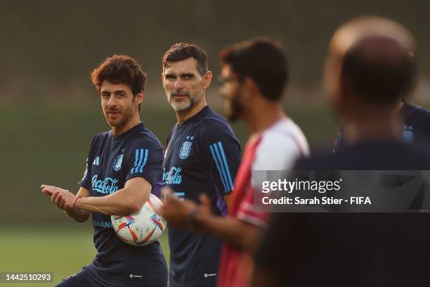 Members of Argentina coaching staff Pablo Aimar and Roberto Ayala look on during the Argentina Community Engagement Event at Qatar University...