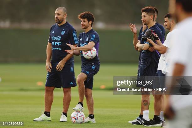 Members of Argentina coaching staff Walter Samuel and Pablo Aimar look on during the Argentina Community Engagement Event at Qatar University...