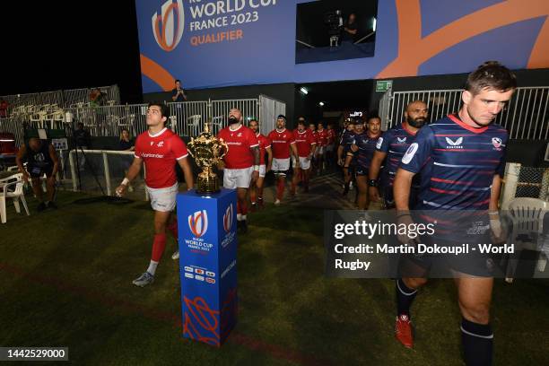 The two teams walk out ahead of the RWC 2023 Final Qualification Tournament match between USA and Portugal at The Sevens Stadium on November 18, 2022...