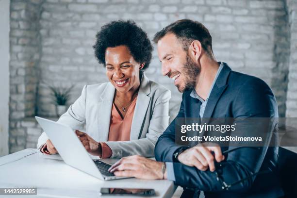 business partners in meeting. - consultation at office desk stockfoto's en -beelden