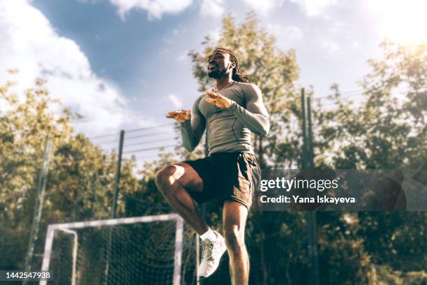 young african-american man doing gym and tabata workout - height imagens e fotografias de stock