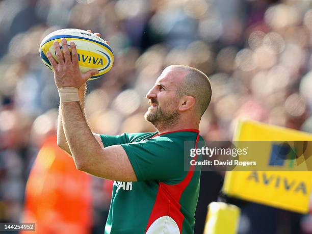 George Chuter of Leicester throws the ball in the warm up during the Aviva Premiership semi final match between Leicester Tigers and Saracens at...