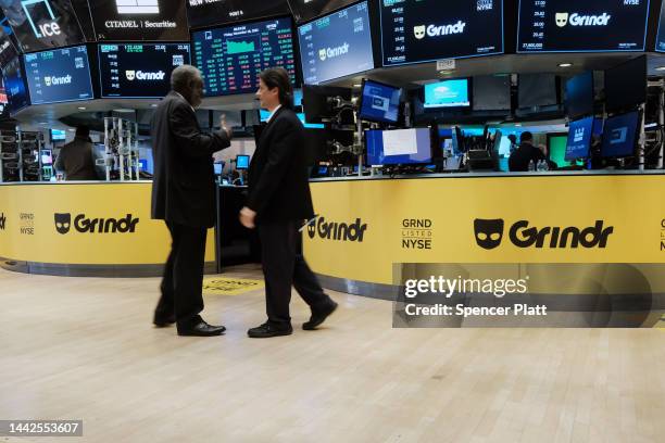 Traders work on the floor of the New York Stock Exchange as the LGBTQ social networking platform Grindr goes public following its merger with special...