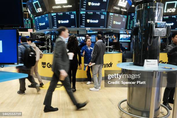 Traders work on the floor of the New York Stock Exchange as the LGBTQ social networking platform Grindr goes public following its merger with special...