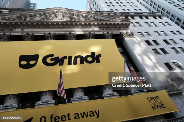 The LGBTQ social networking platform Grindr displays its banner outside of the New York Stock Exchange as the company goes public following its...