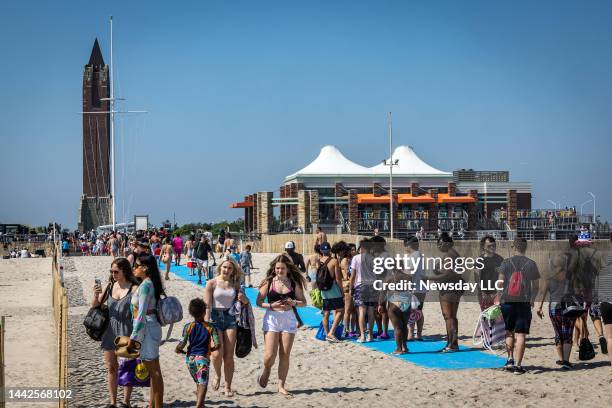 Large crowd of beachgoers descend on Jones Beach State Park at Field 4 in Wantagh. New York, on May 21, 2022.