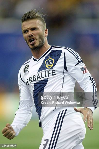 David Beckham of the Los Angeles Galaxy celebrates his game tying penalty kick during the MLS match against the Montreal Impact at the Olympic...