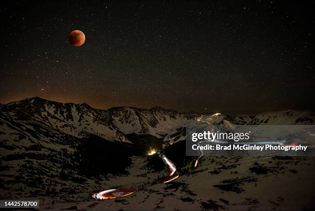 blood moon at loveland pass colorado - keystone stock-fotos und bilder